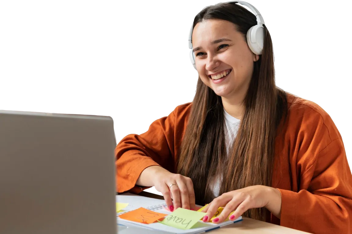 Student smiling while studying in an online tutoring session